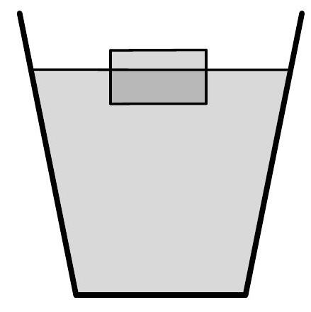 A diagram of a horizontal cork partially submerged in a glass of water, showing the cork lying on its side with part above the water surface.