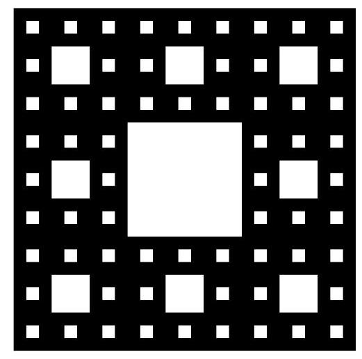 A black and white fractal pattern showing a large square with a central square hole and smaller square holes arranged in a 3x3 grid pattern, illustrating the construction of S_3.